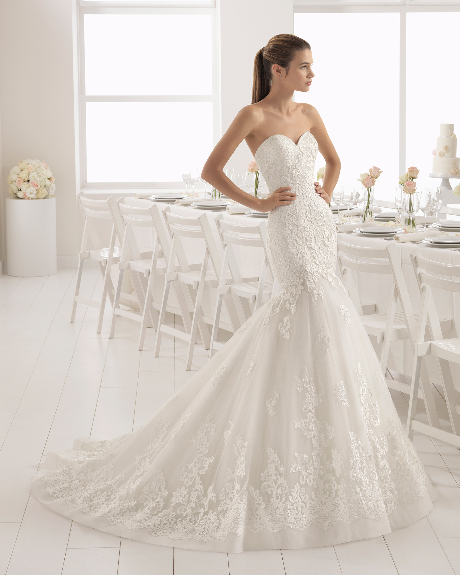 Mermaid-style lace wedding dress with sweetheart neckline.