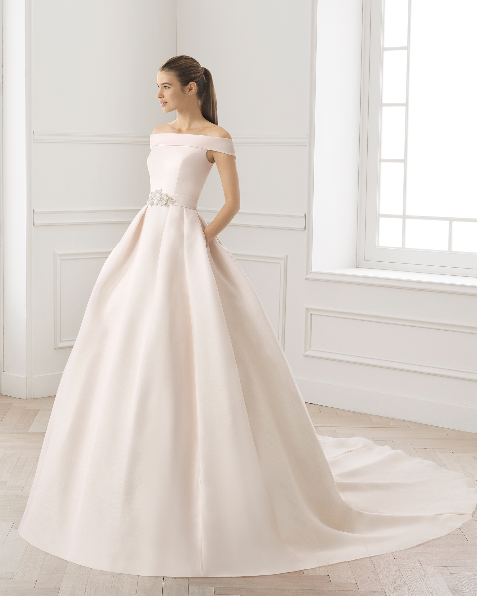 Classic-style tailored gazar wedding dress with bateau neckline and natural waist, in rose and natural.