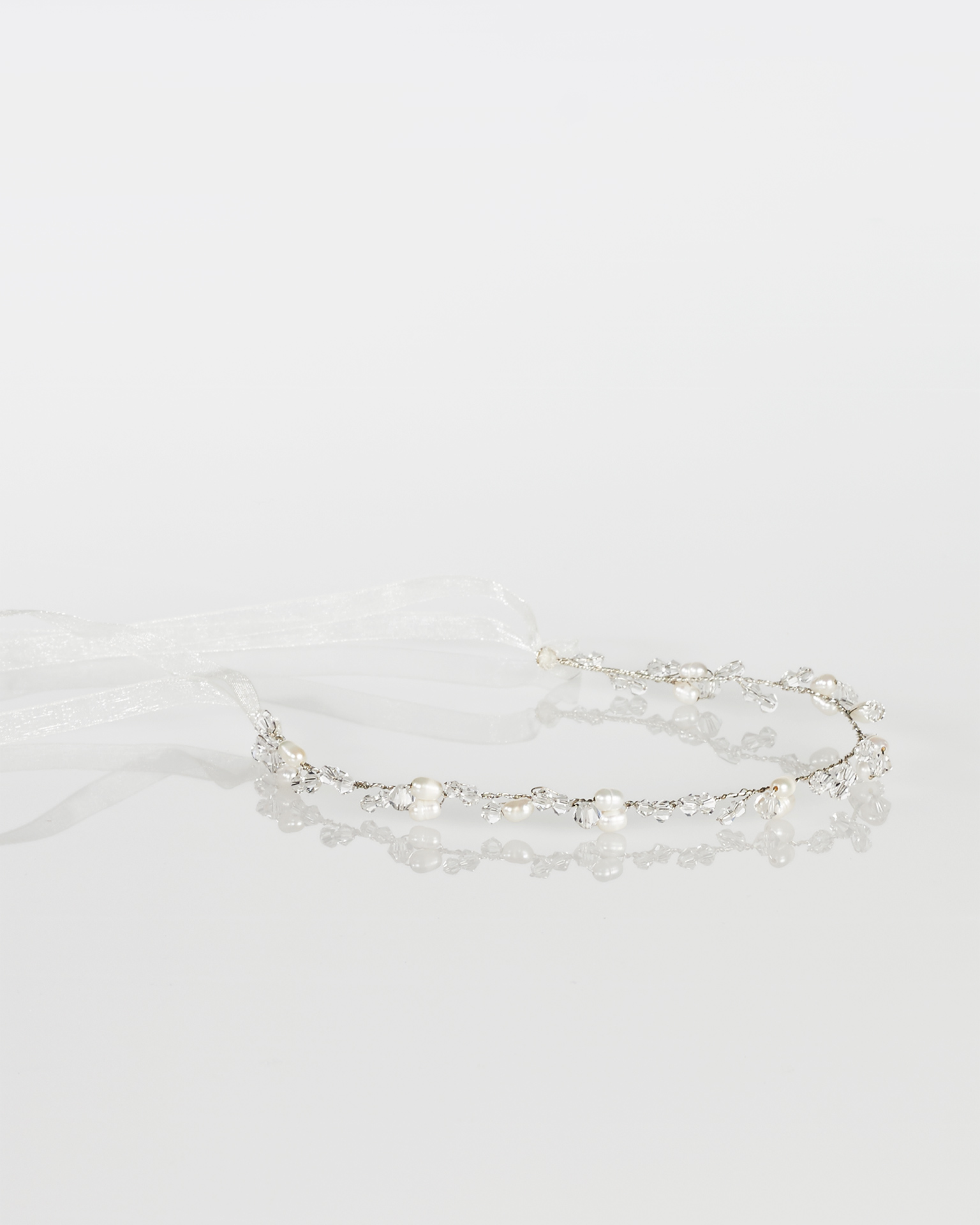 Metallic fibre and crystal bridal diadem with organza ribbon. 2018 Collection.