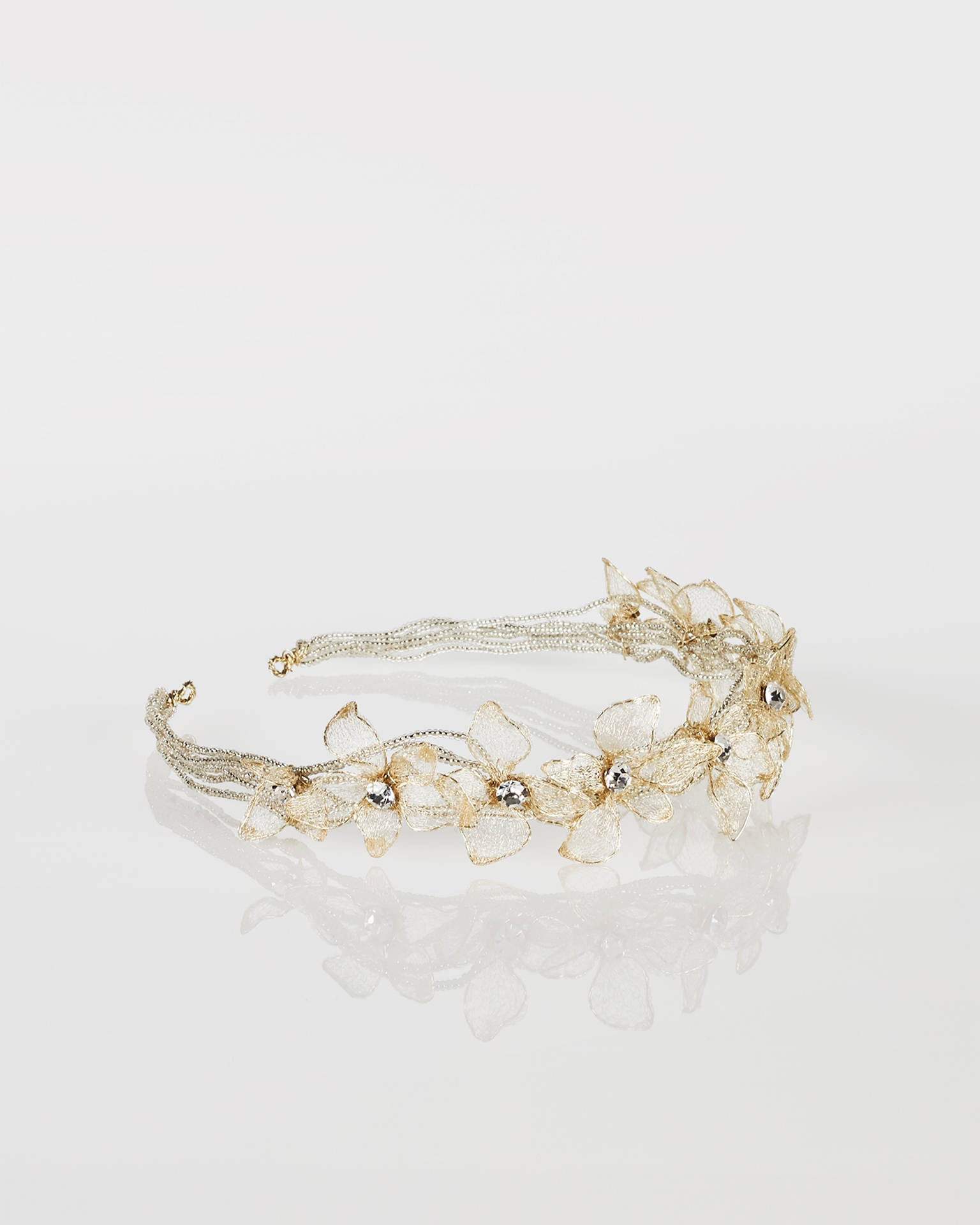Metallic fibre and crystal bridal headpiece, in gold. 2018 Collection.